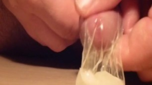 Slow jerking until cum in Condom